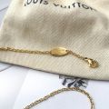Louis Vuitton, Jewelry, Authentic Louis Vuitton M688 Logo Essential V  Accessories Pierce Gold Plated G